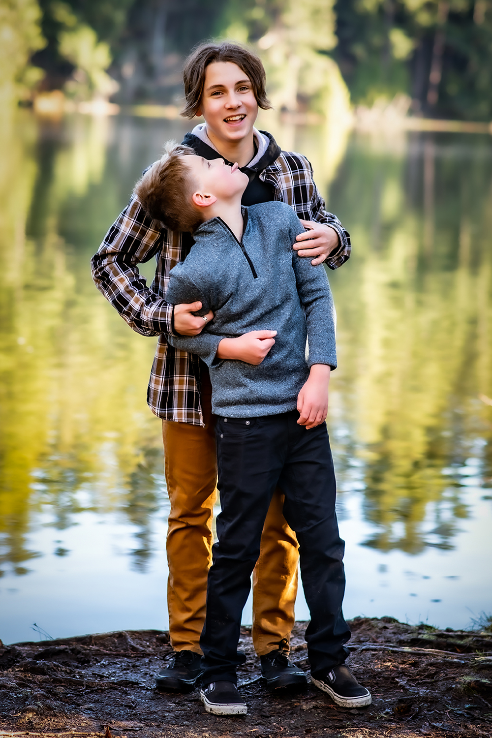 brothers goofing around during a family portraits photography session with Adina Stiles Photography